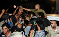 Saif Al-Islam greets supporters