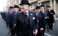 Members of a London club enjoy a laugh during a ceremony