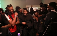 Grime MC's laugh during a clash at a radio station i