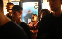 People gather in a cafe in Willsden Green to listen to grime artists.