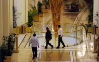 An armed man walks through the Rixos