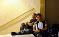 Two members of the media wait