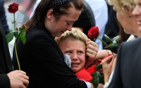 Mourners react in Wootton Bassett, 2010